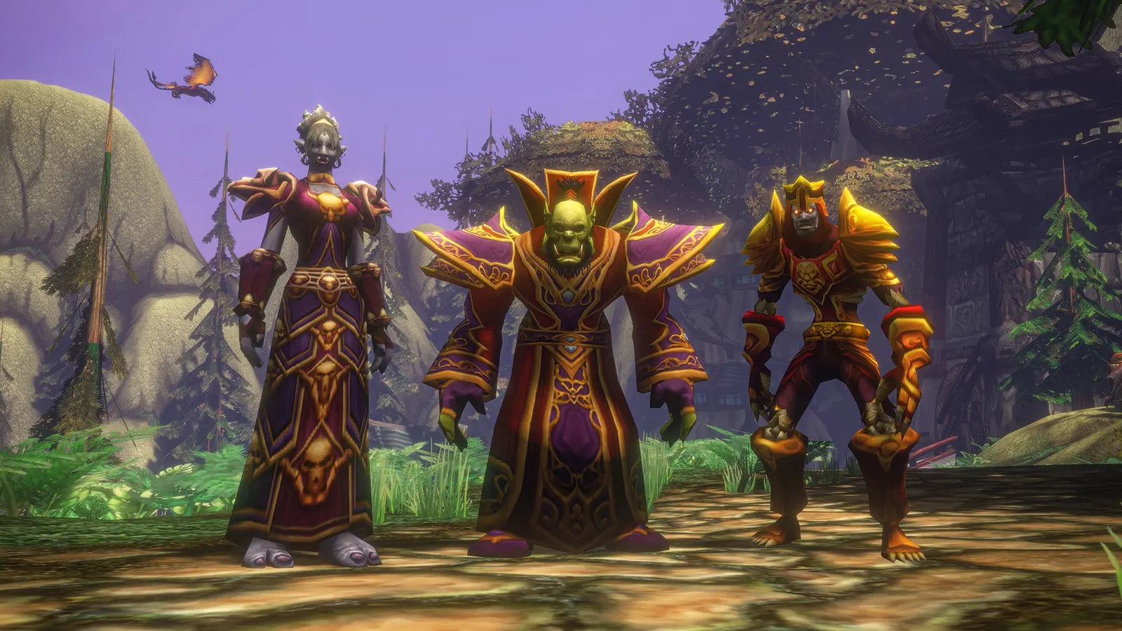 Three characters in robes and armor in a forest