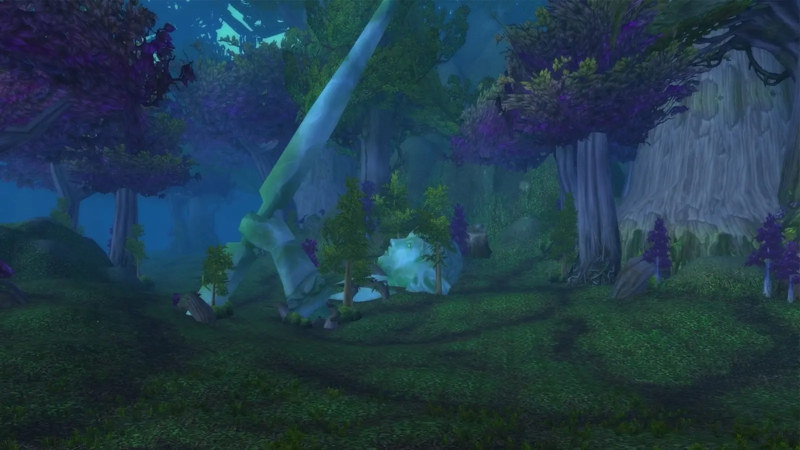 Tall blue-green trees and cliffs in Ashenvale